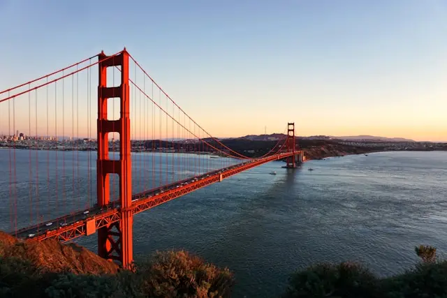Golden Gate Bridge spanning San Francisco Bay at sunset