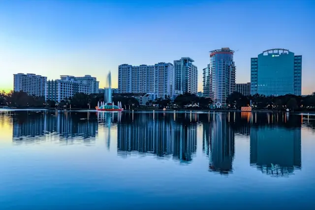 Orlando skyline reflected in Lake Eola at sunset